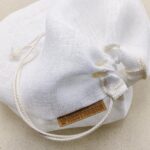 Der Nectarbar Filterbeutel ist am Baumwollband zugezogen.